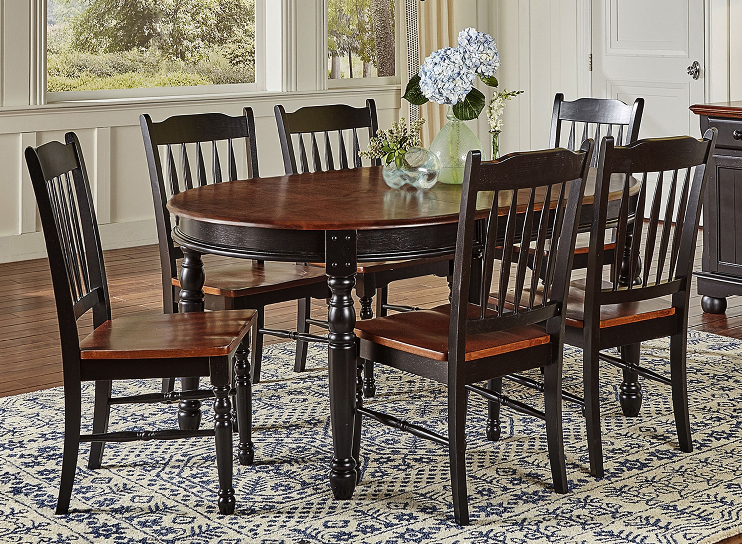 British Isles 7-pc. Oval Slatback Dining Set with Leaves | Raymour ...